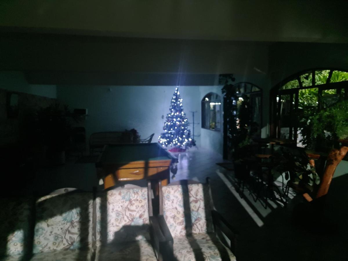 Pousada Nossa Senhora Penedo  Esterno foto A Christmas tree in a house in the Philippines