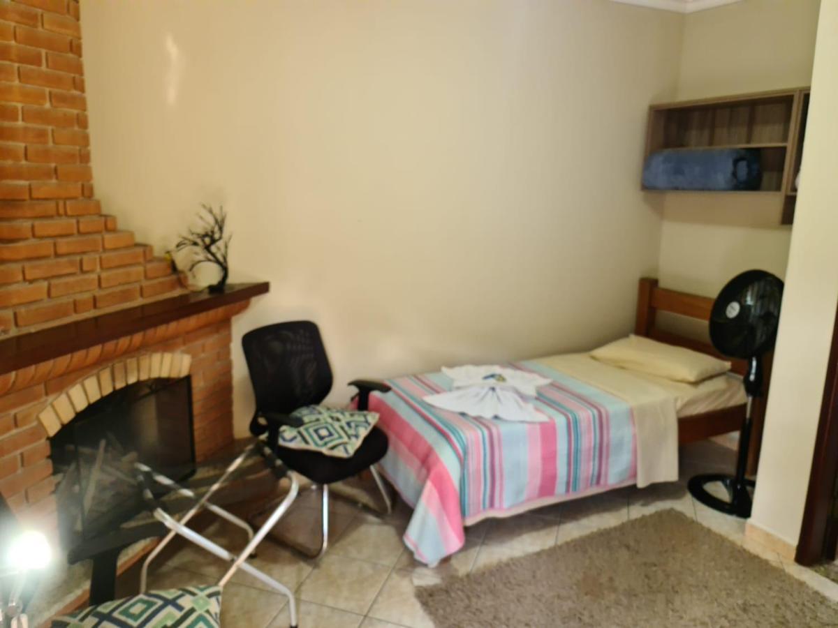 Pousada Nossa Senhora Penedo  Esterno foto A typical bedroom at the hostel