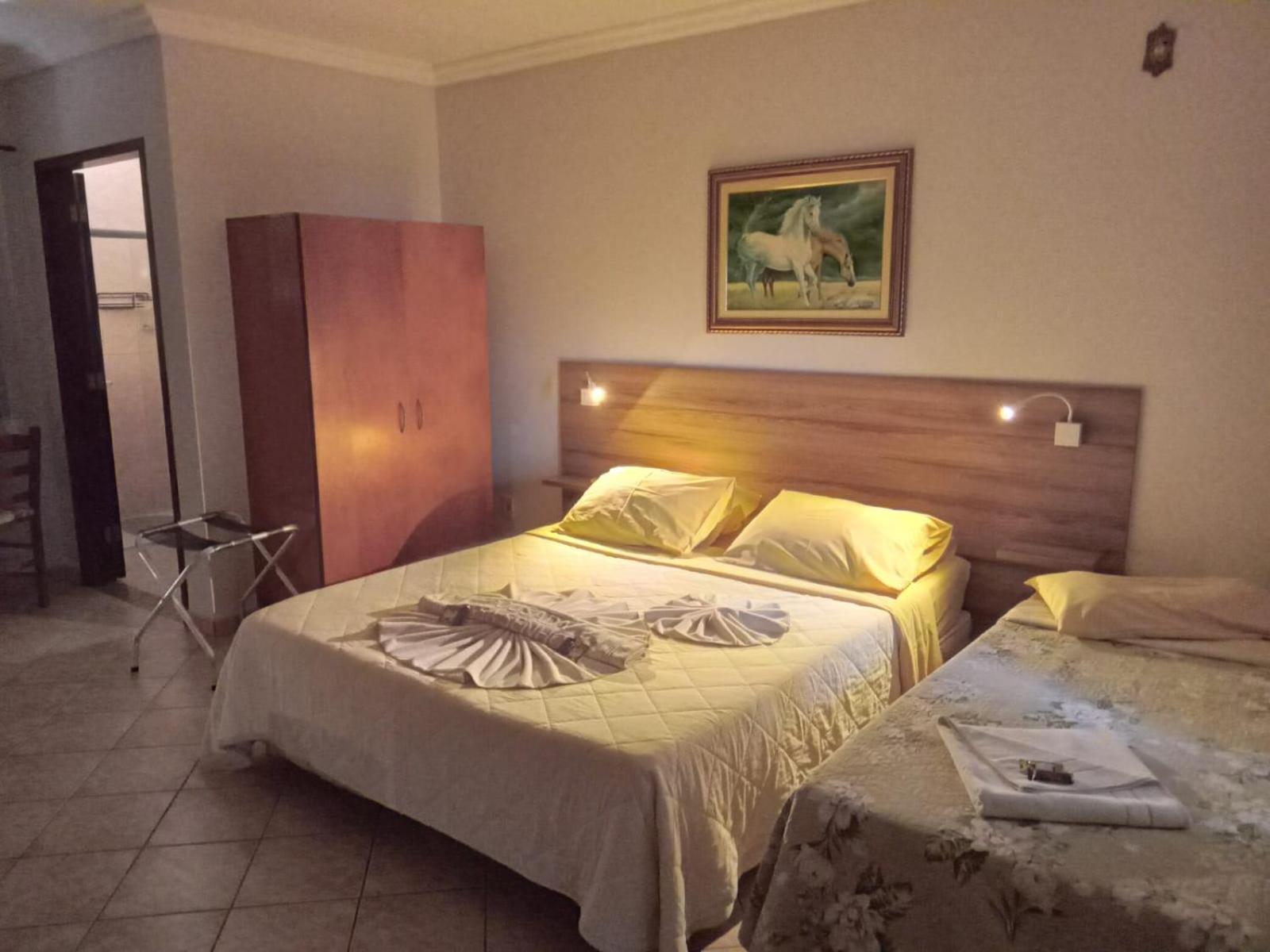Pousada Nossa Senhora Penedo  Camera foto A bedroom in a hotel