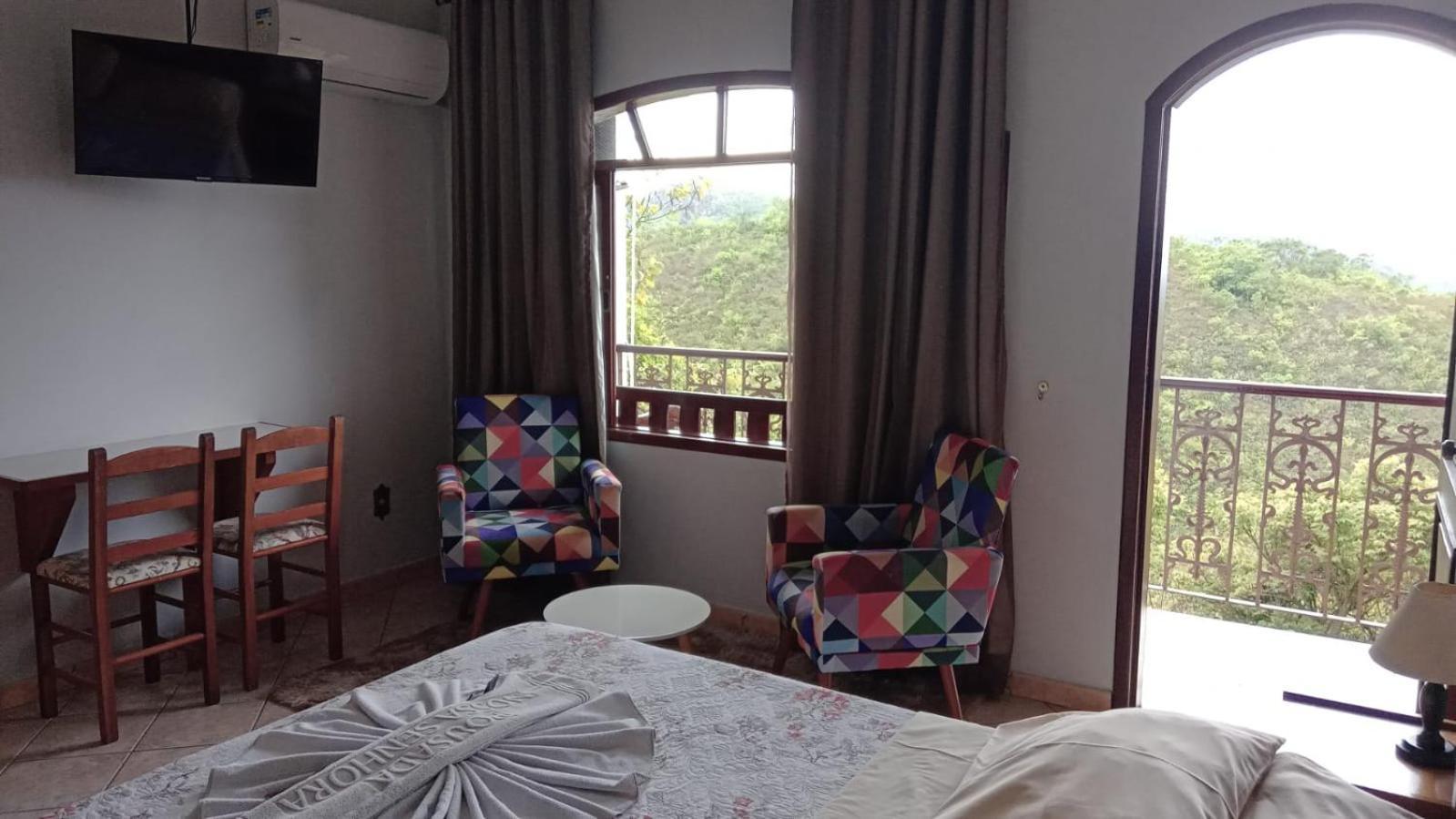 Pousada Nossa Senhora Penedo  Camera foto A room at the hotel