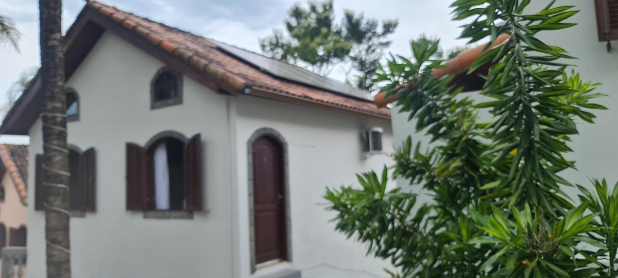 Pousada Nossa Senhora Penedo  Camera foto Solar panels on a house in Brazil