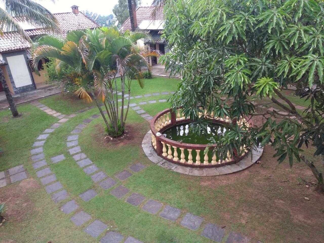 Pousada Nossa Senhora Penedo  Esterno foto The garden of the house