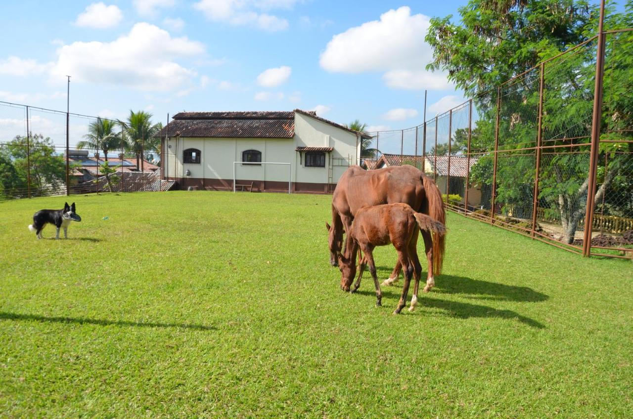 Pousada Nossa Senhora Penedo  Esterno foto A horse farm in the city